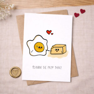 Kartka walentynkowa jajko i masło z napisem "ścinam się przy tobie"
